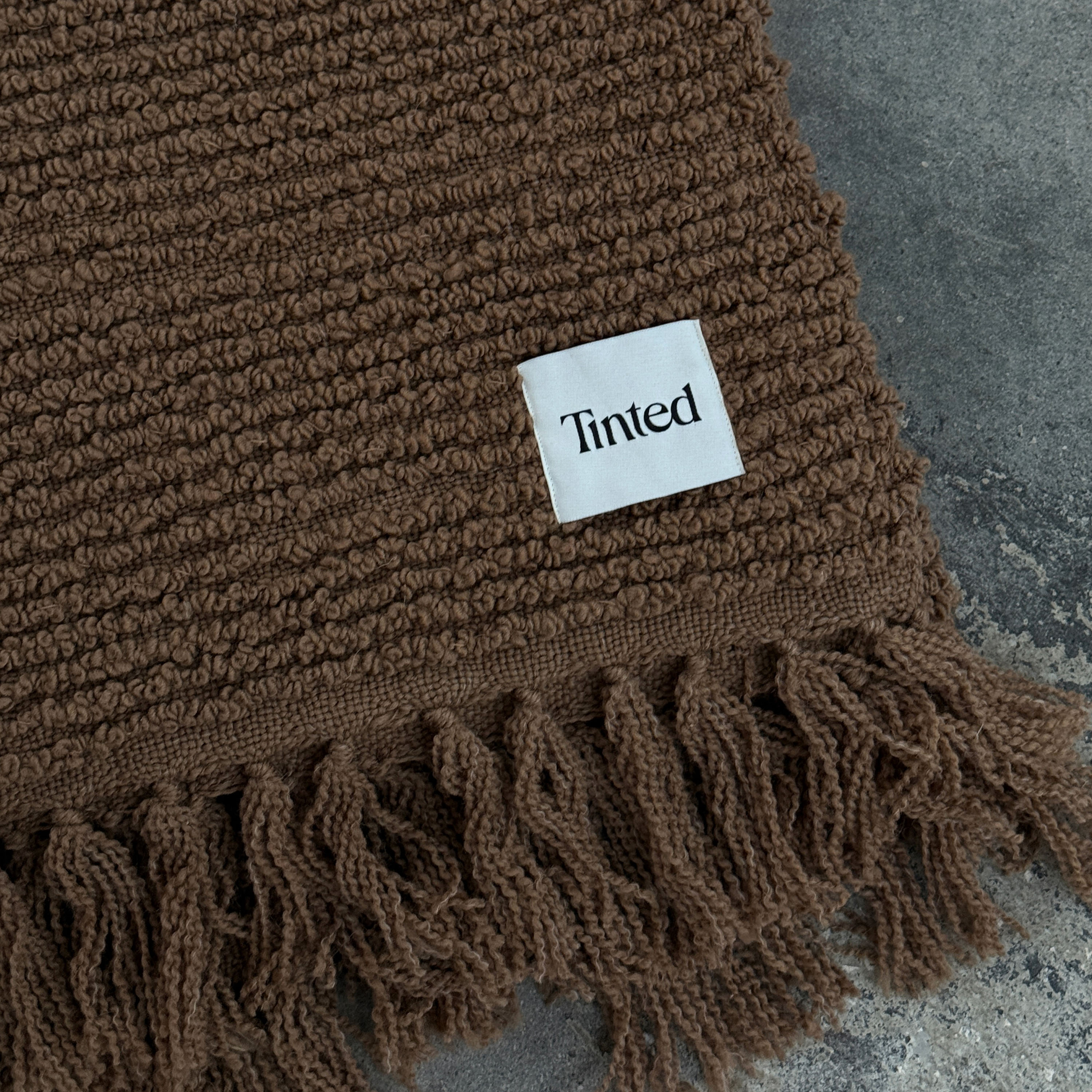 Tinted Janzen Bouclépläd Offwhite Rust 130x170