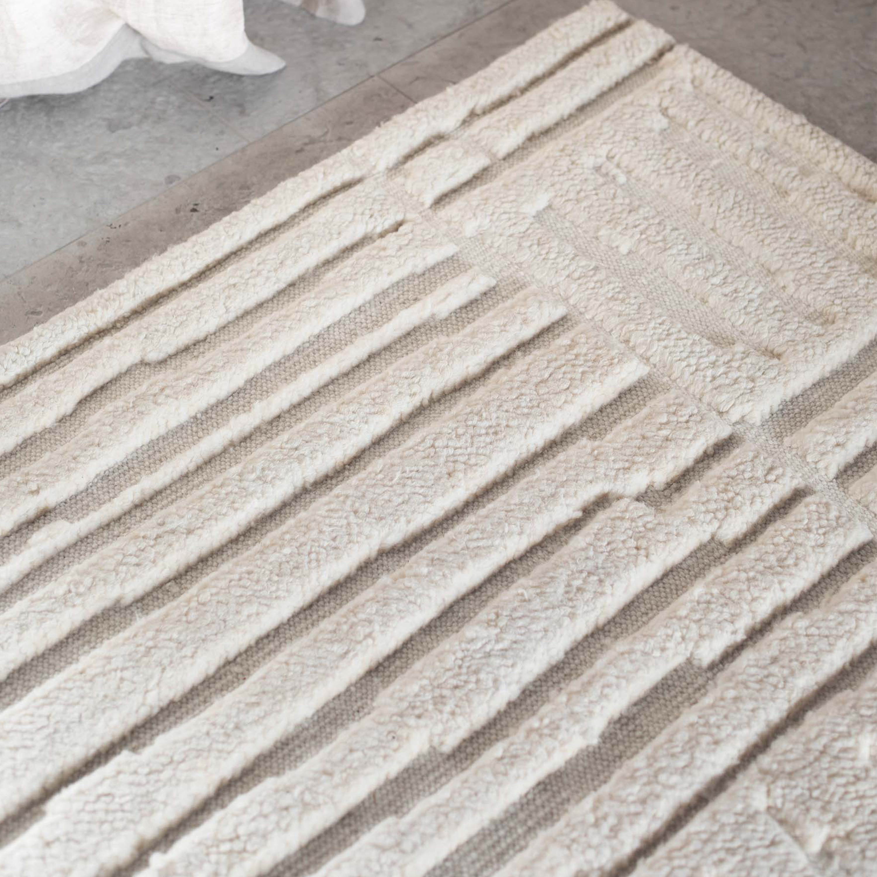 Tell me more Sandnes Ullmatta White 200x300