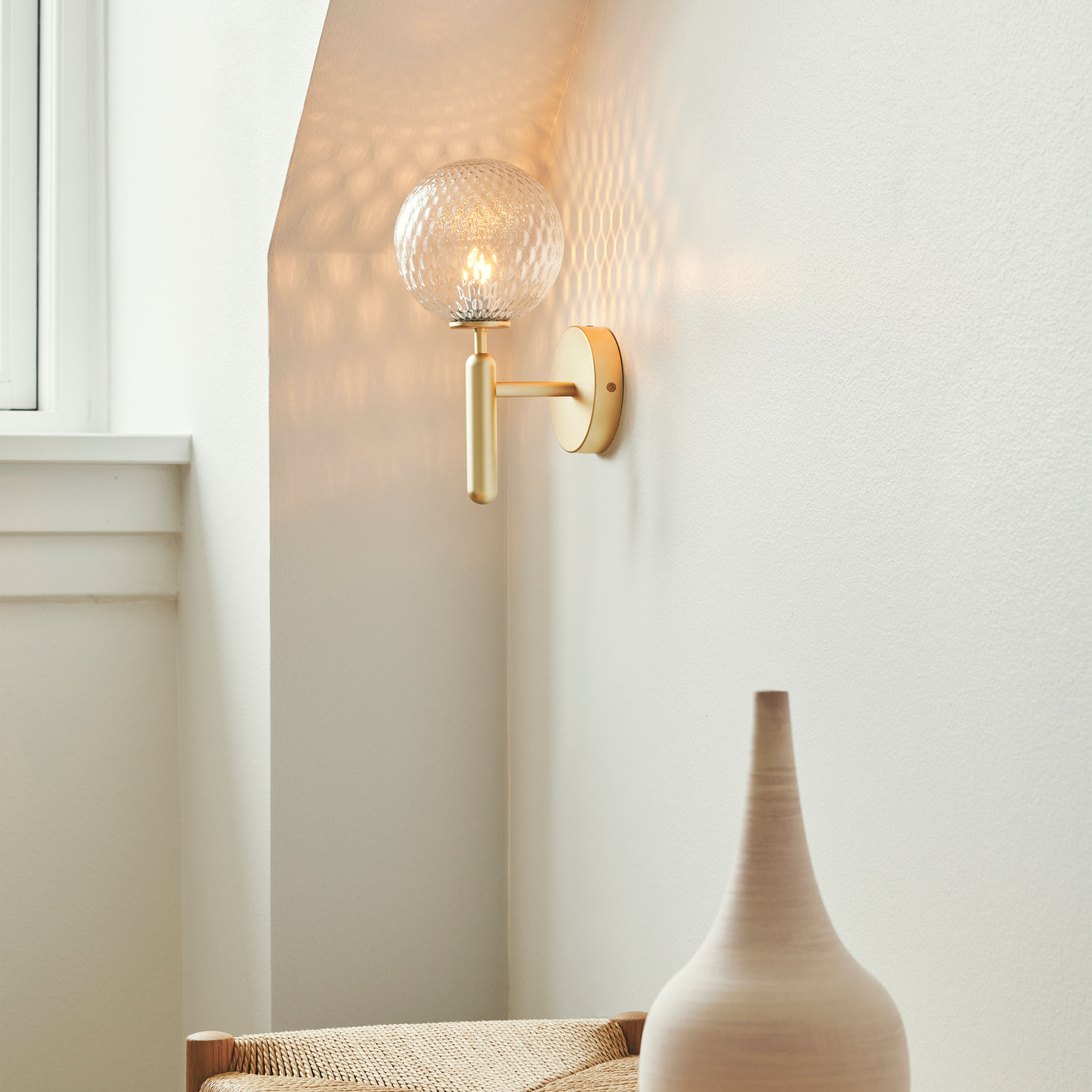 Nuura Miira Vägglampa Brass/Optic Clear