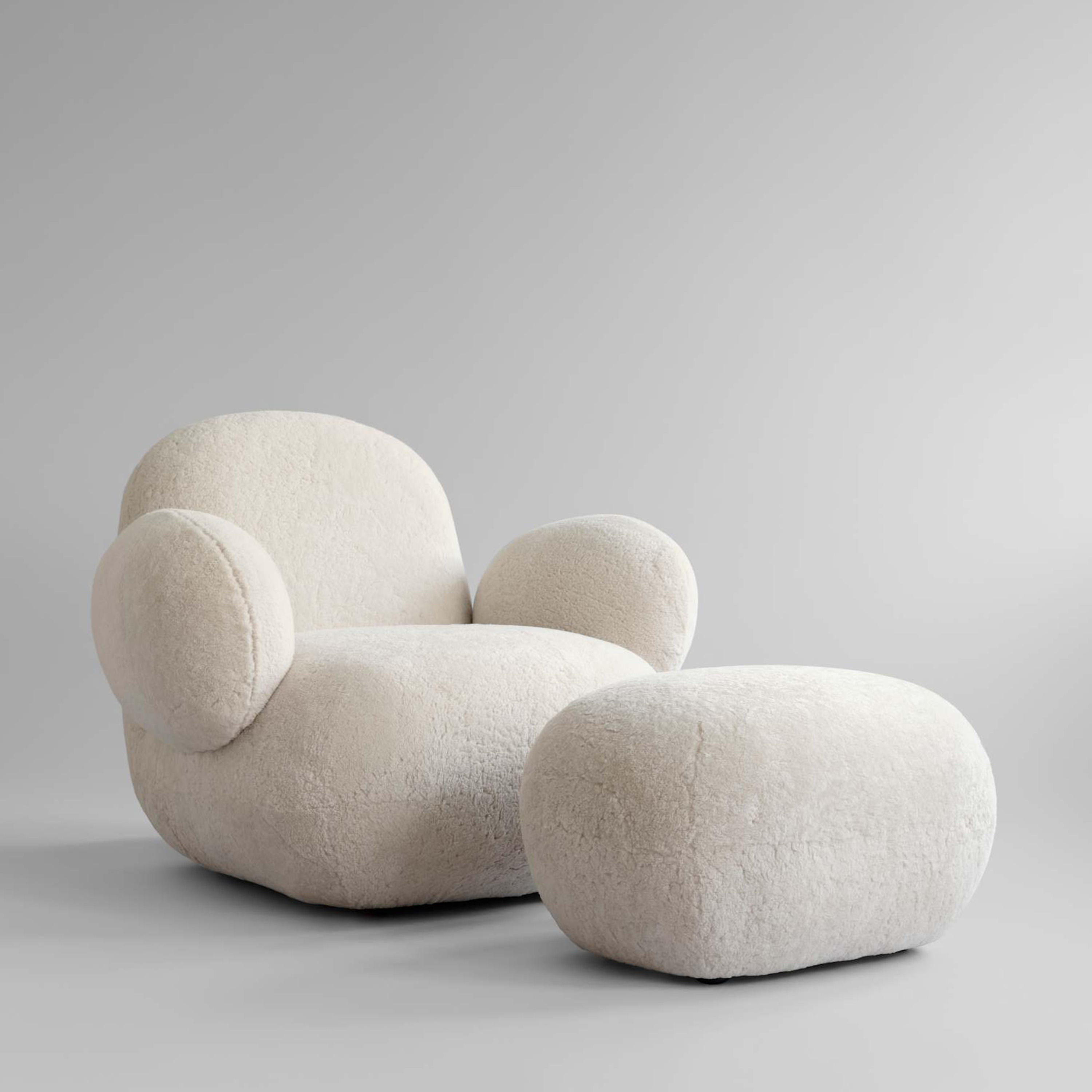 101 Copenhagen Toe Ottoman Fotskammel Saueskinn Sandshell 60x45