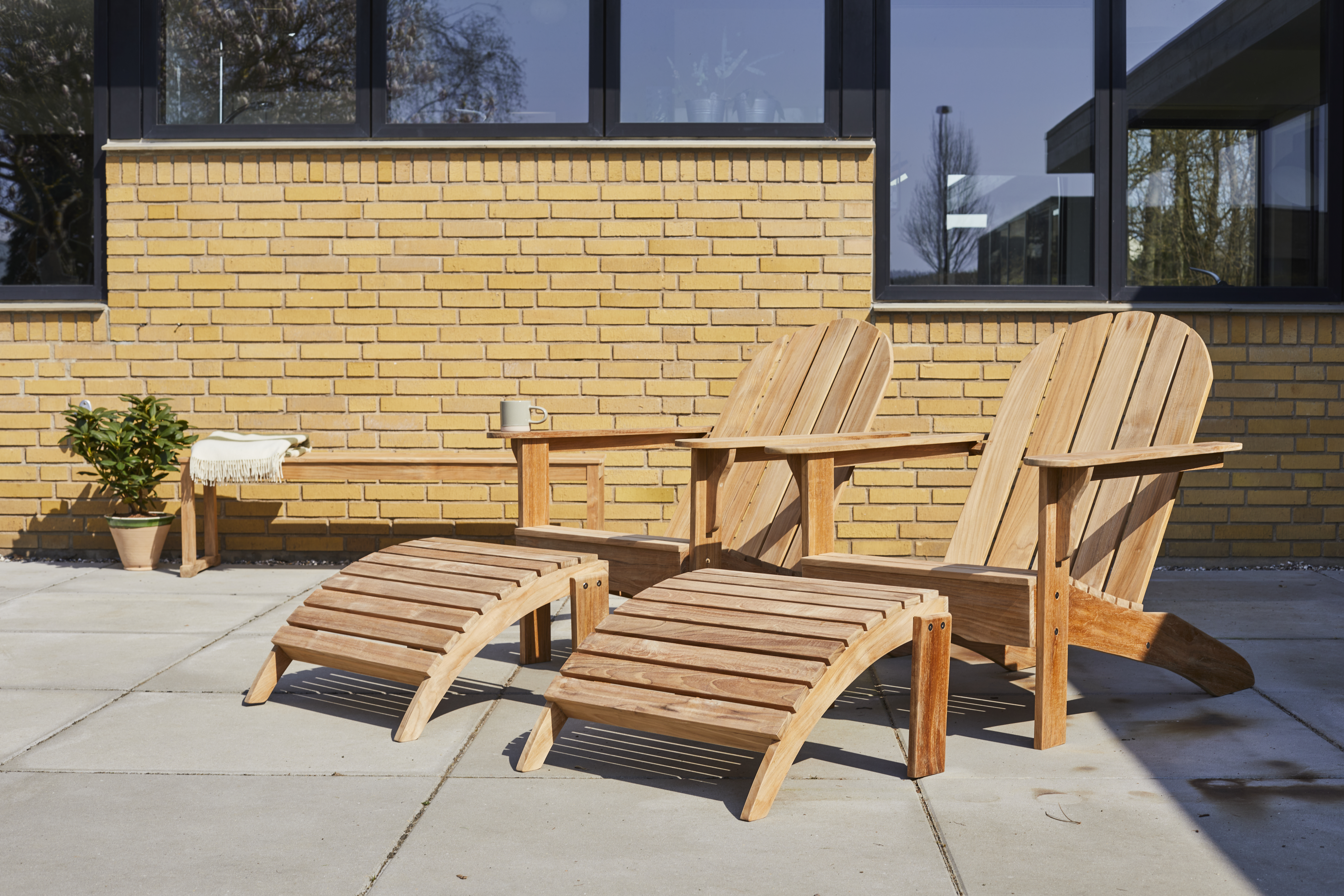 Cinas Adirondack Fußhocker aus Teakholz